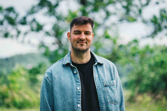 Portrait of Denis, co-facilitator.